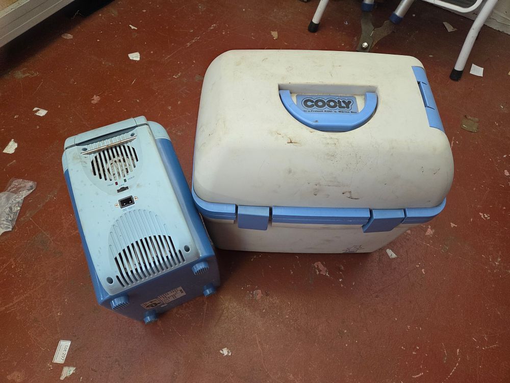 Lot 214 – Two Cooly Portable Electric Travel Cooler Boxes