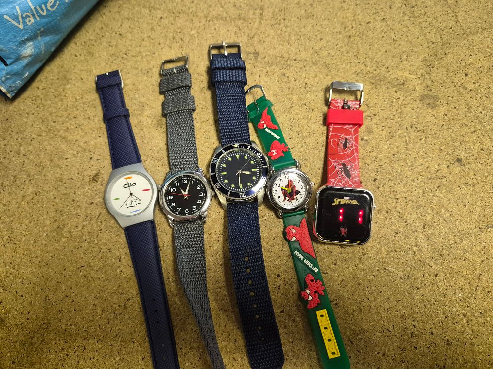 Lot 7 – An Assortment of Character and Fashion Wristwatches
