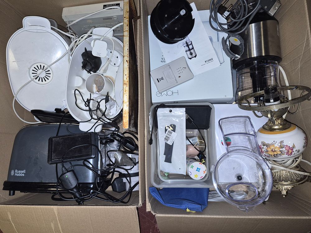 Lot 81 – Two Boxes of Miscellaneous Kitchen Appliances and Electronic Accessories Including Russell Hobbs and Garmin