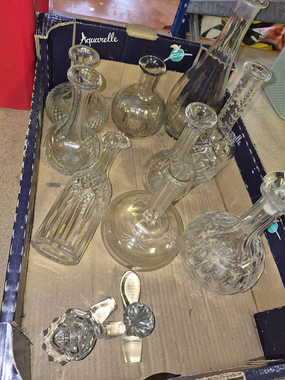 Lot 103 – An Assortment of Clear Glass and Crystal Decanters