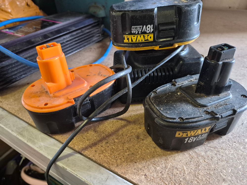 Lot 18 – Three 18V Batteries and Charging Base