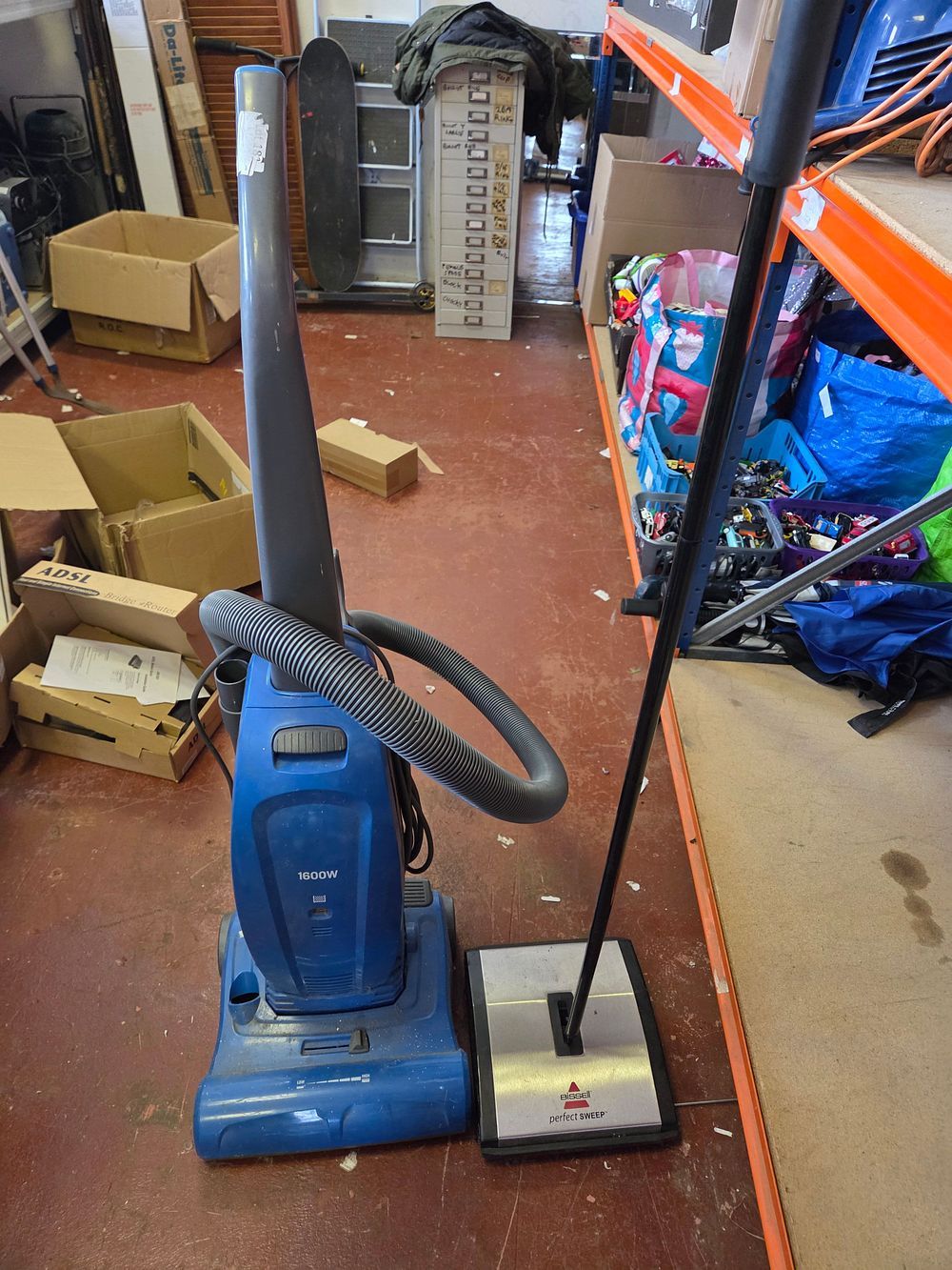 Lot 109 – Two Floor Cleaning Appliances Including a Bissell Perfect Sweep and an Upright Vacuum Cleaner w/o