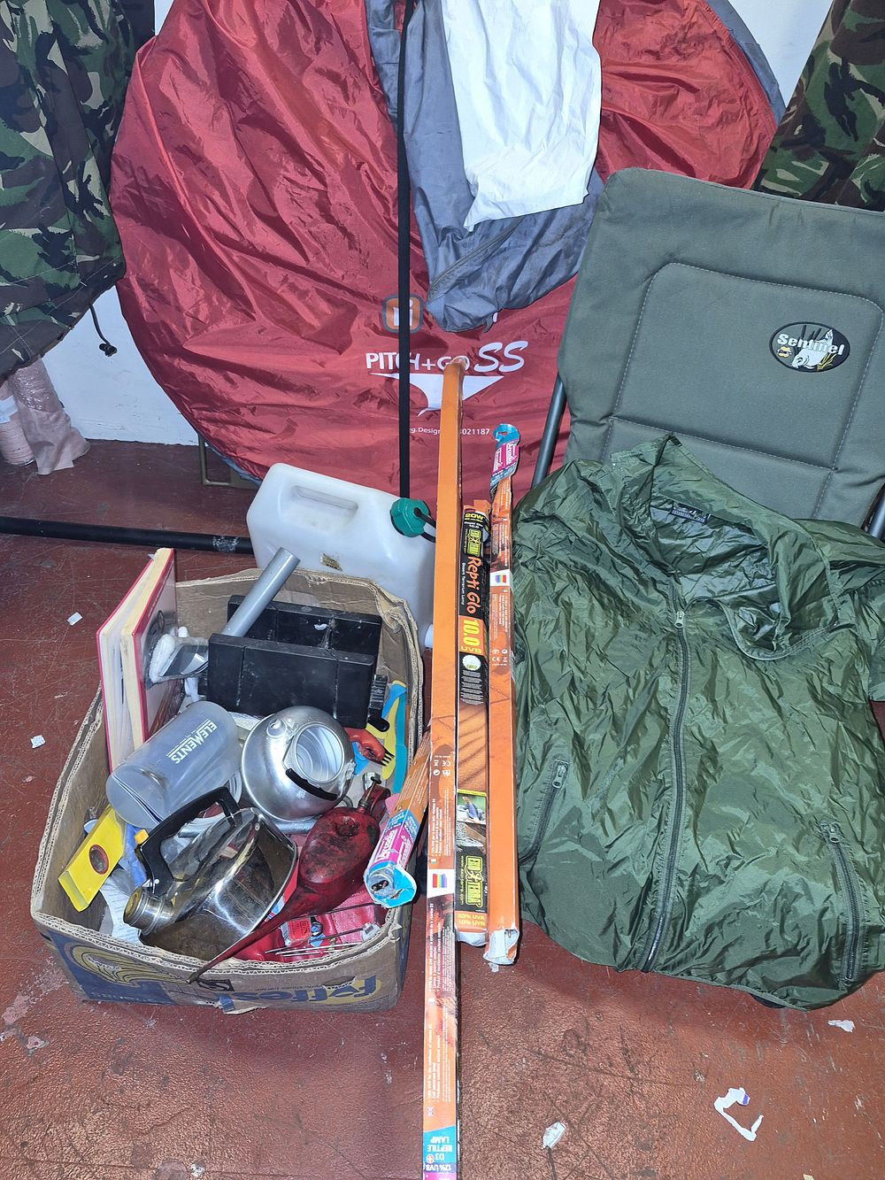 Lot 216 – A Collection of Camping, Outdoor, and Reptile Equipment Including Sentinel Fishing Chair and Exo Terra Lighting