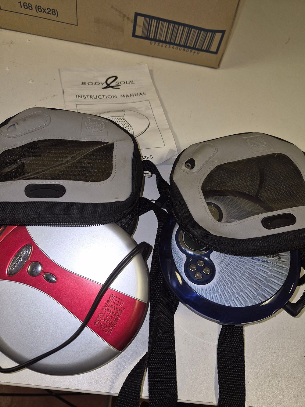 Lot 238 – Two Philips and Roadstar Portable CD Players with Body & Soul Cases and manual