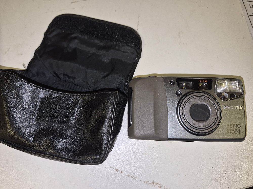 Lot 239 – Pentax Espio 115M 35mm Compact Camera with soft case