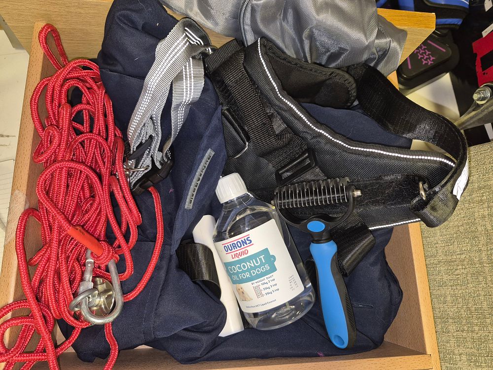 Lot 271 – A Collection of Pet Accessories Including Hurtta Harness and Ourons Coconut Oil