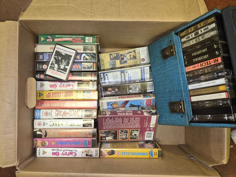Lot 282 – A Collection of VHS Video Tapes and Audio Cassettes Including Carry On Film Titles