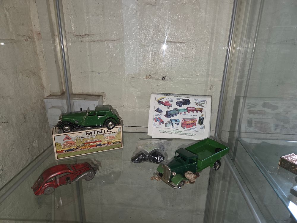 Lot 600 – Three Vintage Tinplate Model Vehicles including Minic Clockwork Coupe boxed