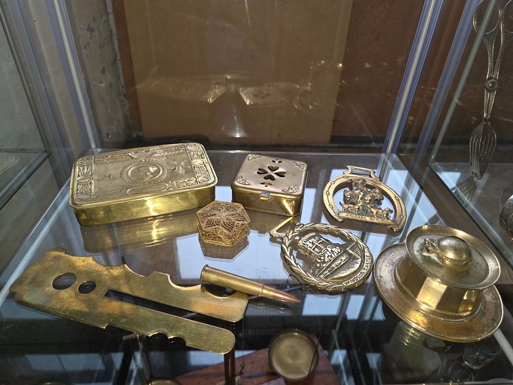 Lot 612 – An Assortment of Brass Military and Commemorative Items Including a 1914 Princess Mary Christmas Tin