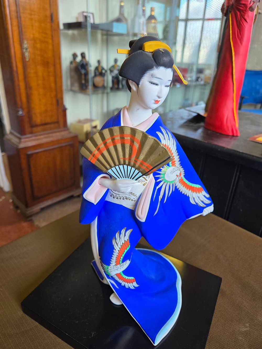 Lot 644 – Japanese Bisque Hakata Doll Depicting a Geisha