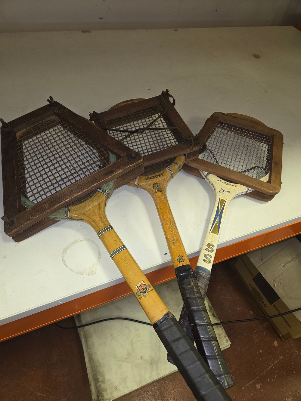 Lot 302 – Three Vintage Wooden Tennis Rackets and Presses