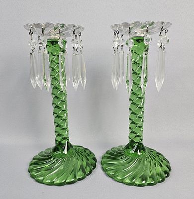 A Pair of Fostoria Green Glass Candlesticks Candlesticks measure 12 inches tall
A pair of 
