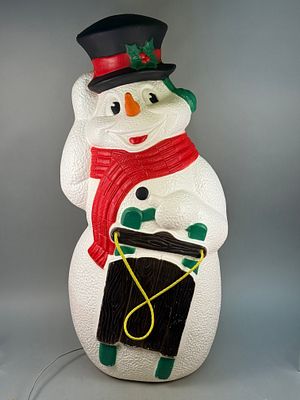 Vintage TPI Christmas Lighted Snowman with Sled Blow Mold, circa 2000. A Vintage TPI Christmas 