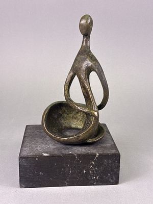 A Modern Abstract Bronze Figurative Sculpture on Marble Base. An abstract figurative sculpture 