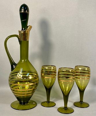 Vintage Romanian Olive Green Glass Four-Piece Decanter Set with Gold Stripes. A vintage Romanian 