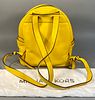 A Michael Kors Yellow 'Erin' Small Studded Backpack. A Michael Kors 'Erin' Small Studded Image - 1