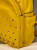 A Michael Kors Yellow 'Erin' Small Studded Backpack. A Michael Kors 'Erin' Small Studded Image - 2