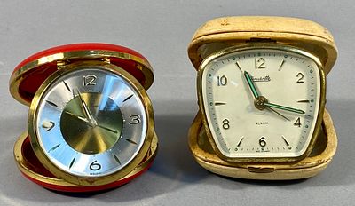 A Pair of Vintage Seth Thomas and Forestville Mechanical Travel Alarm Clocks, Germany. A pair of 