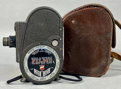 Vintage Bell & Howell Filmo Sportster Double Run Eight 8mm Movie Camera with Case. A vintage 