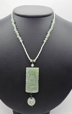 Sterling Carved Jade Necklace 34.9 Grams. Necklace Measures 28" Necklace Weighs 34.9 Grams