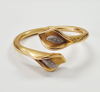 14K Yellow Gold Diamond Calla Lily Bypass Bangle. This 17.3 gram 14k yellow gold bypass-style 