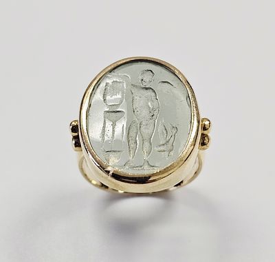 A 14kt Yellow Gold and Pale Green Intaglio Ring. This ring is a size 6. Ring weighs 5.7 Grams 