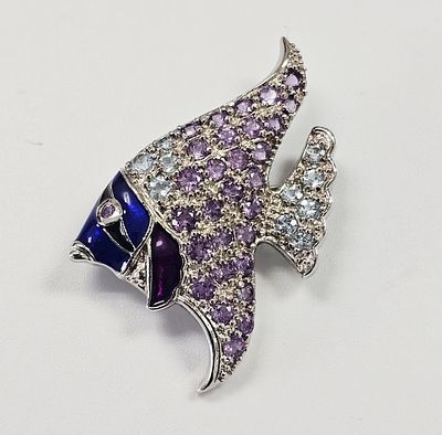 A Sterling Silver Enamel and Gemstone Angelfish Brooch. A sterling silver brooch modeled in the 