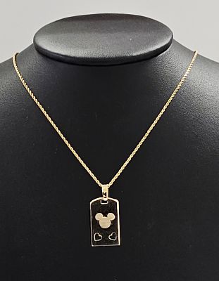 A 14K Yellow Gold Disney Mickey Mouse Necklace. This 14K yellow gold necklace features a dog-tag 