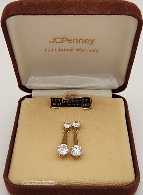 14kt Gold-Filled & Diamond Earrings 2.4 Grams. This lot features a pair of gold-filledellow 