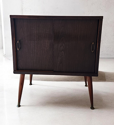 Lu Van Inc. Mid-Century Modern Record Cabinet. A mid-century modern record cabinet manufactured 