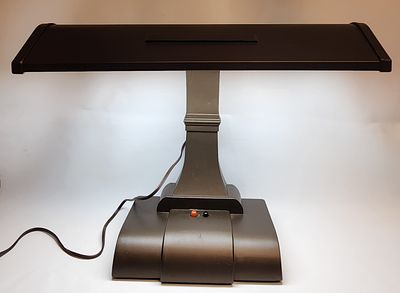 Mid-Century Modern Style Bronze-Tone Metal Desk Lamp. A mid-century modern style metal desk or 