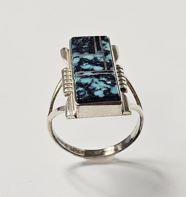 A. Yazzie Navajo Sterling Turquoise Ring 5.8 Grams. This sterling silver ring features a 