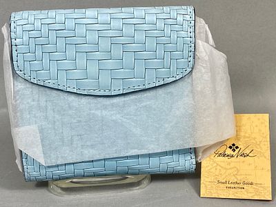 Patricia Nash Reiti Wallet. This Patricia Nash Reiti wallet is constructed from woven embossed 