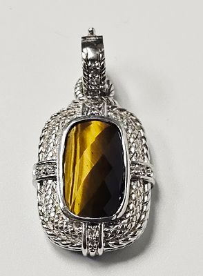 Judith Ripka Sterling Tiger's Eye Pendant 11.8 Grams. A sterling silver pendant by Judith Ripka 