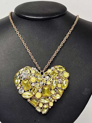 Betsey Johnson Rose Gold-Tone Heart Pendant Necklace. A costume jewelry necklace by Betsey 
