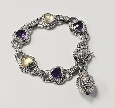 Judith Ripka Sterling Cubic Zirconia Bracelet 54.7 Grams. A sterling silver heart-link bracelet 