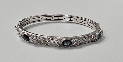 Judith Ripka Sterling Hinged Bangle Bracelet 31.7 Grams. A sterling silver hinged bangle 