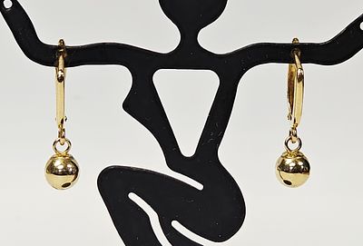14K Gold Spherical Bead Drop Earrings .92 Grams. A pair of drop earrings crafted in 14 karat 