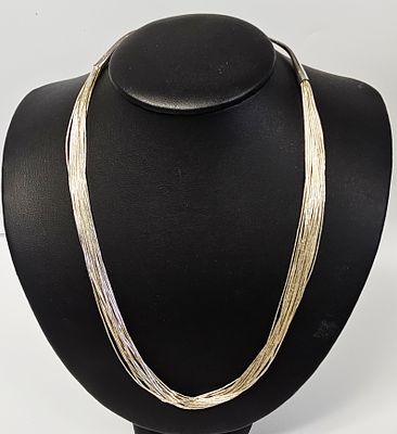 Running Bear Sterling Liquid Silver Necklace 18.3 Grams. This multi-strand necklace is produced 