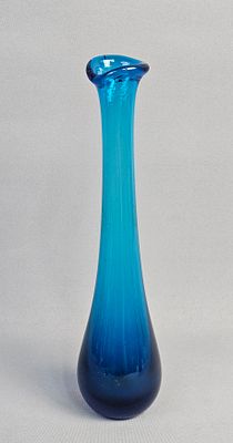 Mid-Century Viking Glass Vase. The vase features a slender, elongated form with an irregularly 