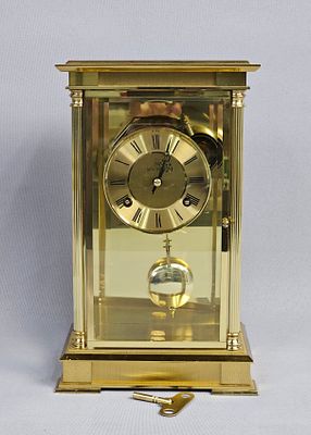 Montreux Brass and Glass Mechanical Mantel Clock. Height: 11 inches Width: 6.5 inches Depth: 4.5 