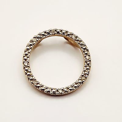 10K Gold Slide Pendant 1.2 Grams. This circular slide pendant is crafted in 10K yellow gold. The 