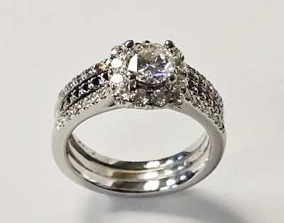 14K Diamond & Sapphire Bridal Ring Set 6.3 Grams. A contemporary three piece bridal ring set 