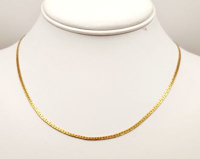 14K Gold S-Link Necklace 4.3 Grams. An Italian 14 karat yellow gold necklace featuring a flat 