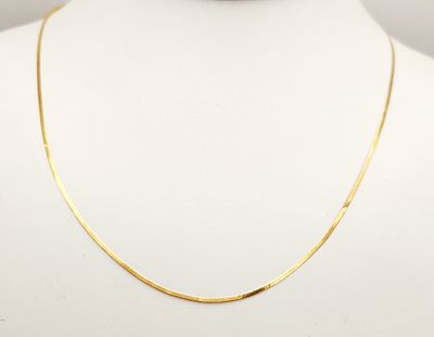 14K Gold Herringbone Necklace 1.3 Grams. A 14kt yellow gold necklace featuring a flat 