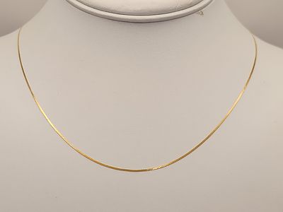 14K Serpentine Necklace 1 Grams. A fine 14 karat yellow gold serpentine link chain necklace 
