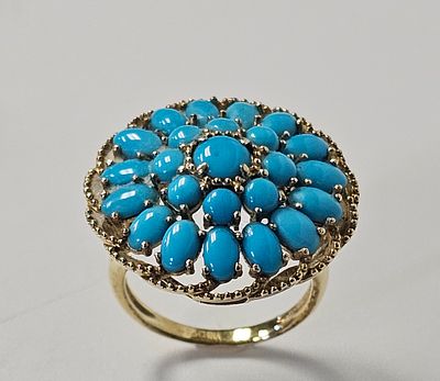 Gold Washed Sterling Turquoise Ring. A turquoise cluster cocktail ring. The interior of the band 