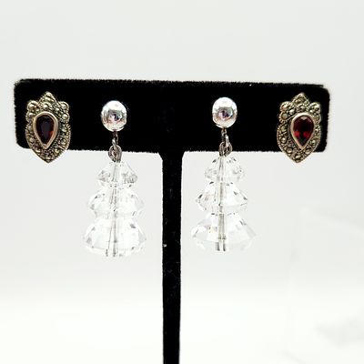 Two Pair Sterling Earrings 11.4 Grams. This lot features two matched pairs of sterling silver 