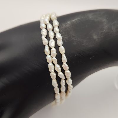 Freshwater Pearl Bracelet Vermeil Clasp. This triple-strand bracelet is composed of white to 