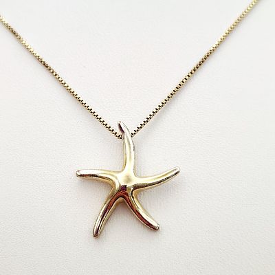 Vermeil Starfish Necklace 4.3 Grams. A yellow gold-plated sterling silver necklace featuring a 